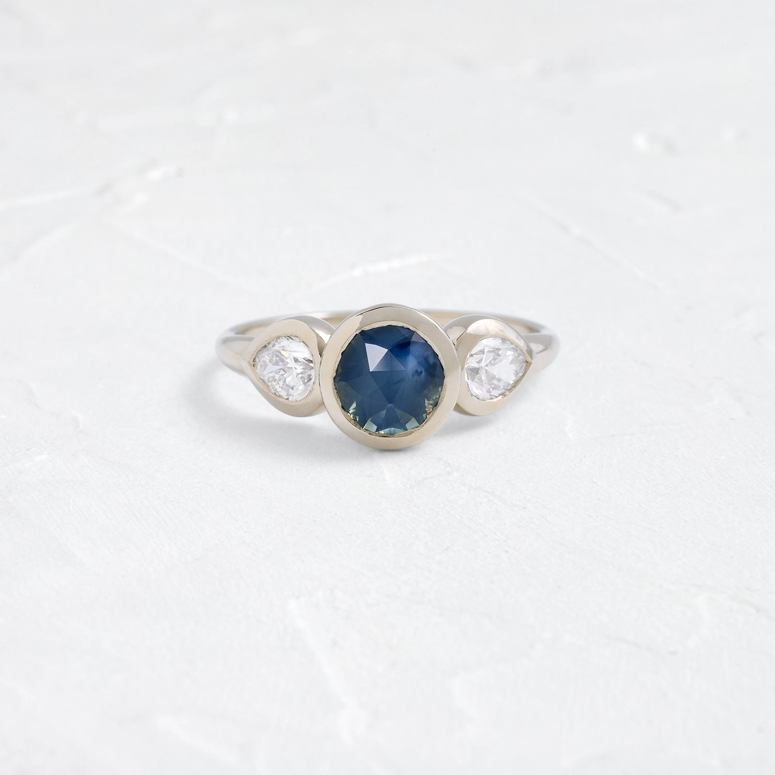 Moonrise Ring, 1.76ct. Round Cut Blue Nigerian Sapphire