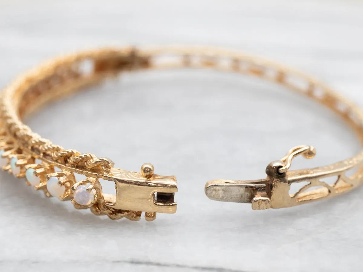 Twisting Gold and Opal Bangle Bracelet