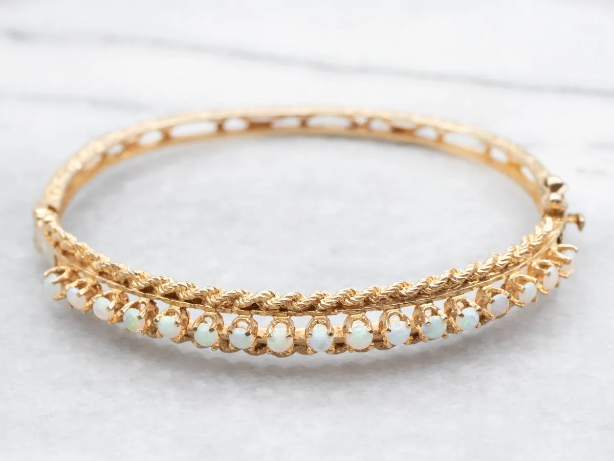 Twisting Gold and Opal Bangle Bracelet