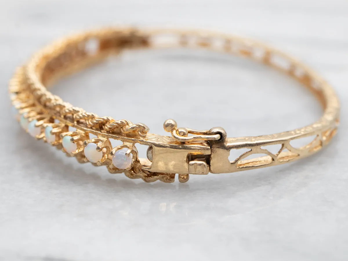 Twisting Gold and Opal Bangle Bracelet