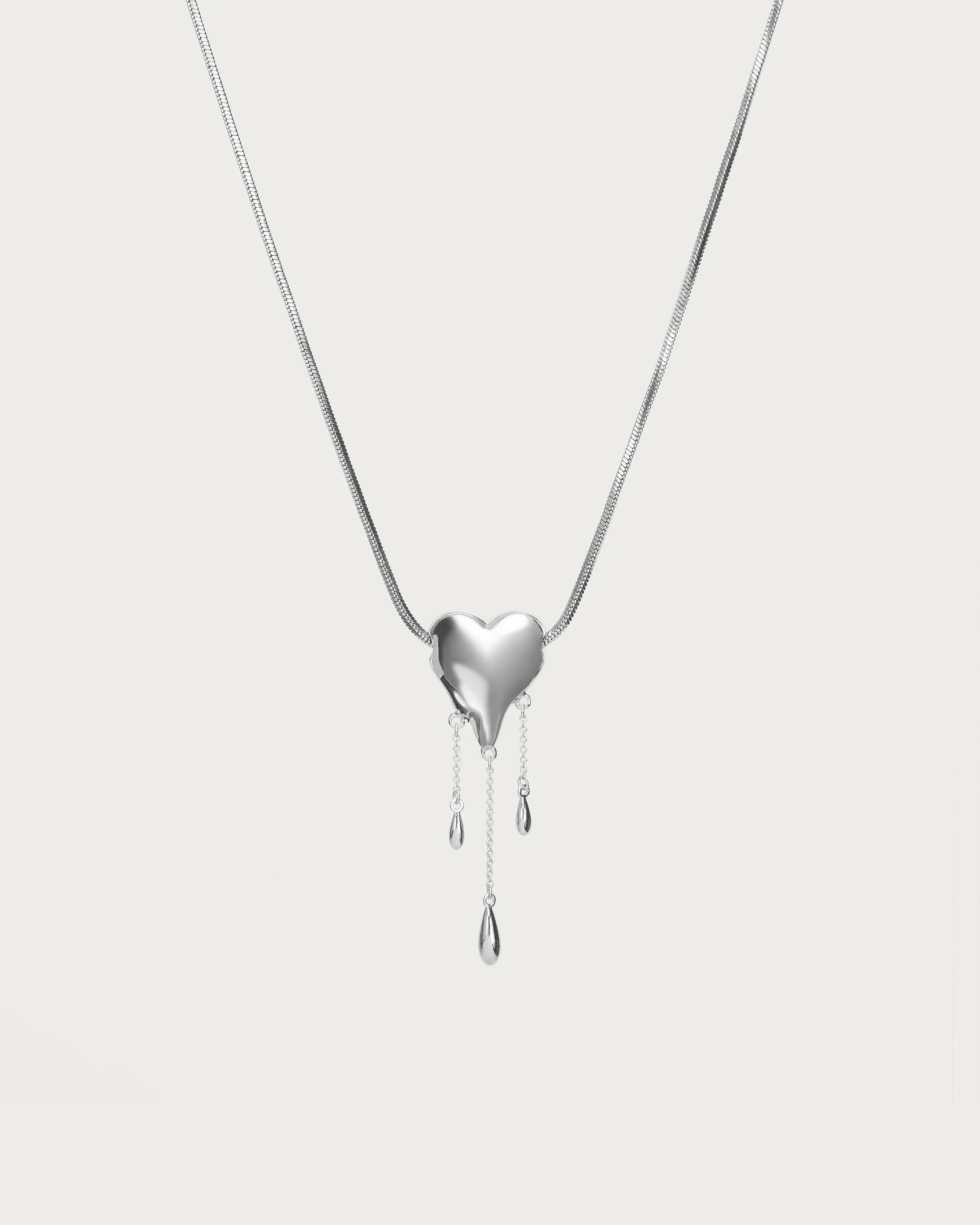 Venom??s Golden Drip Heart Necklace in Silver