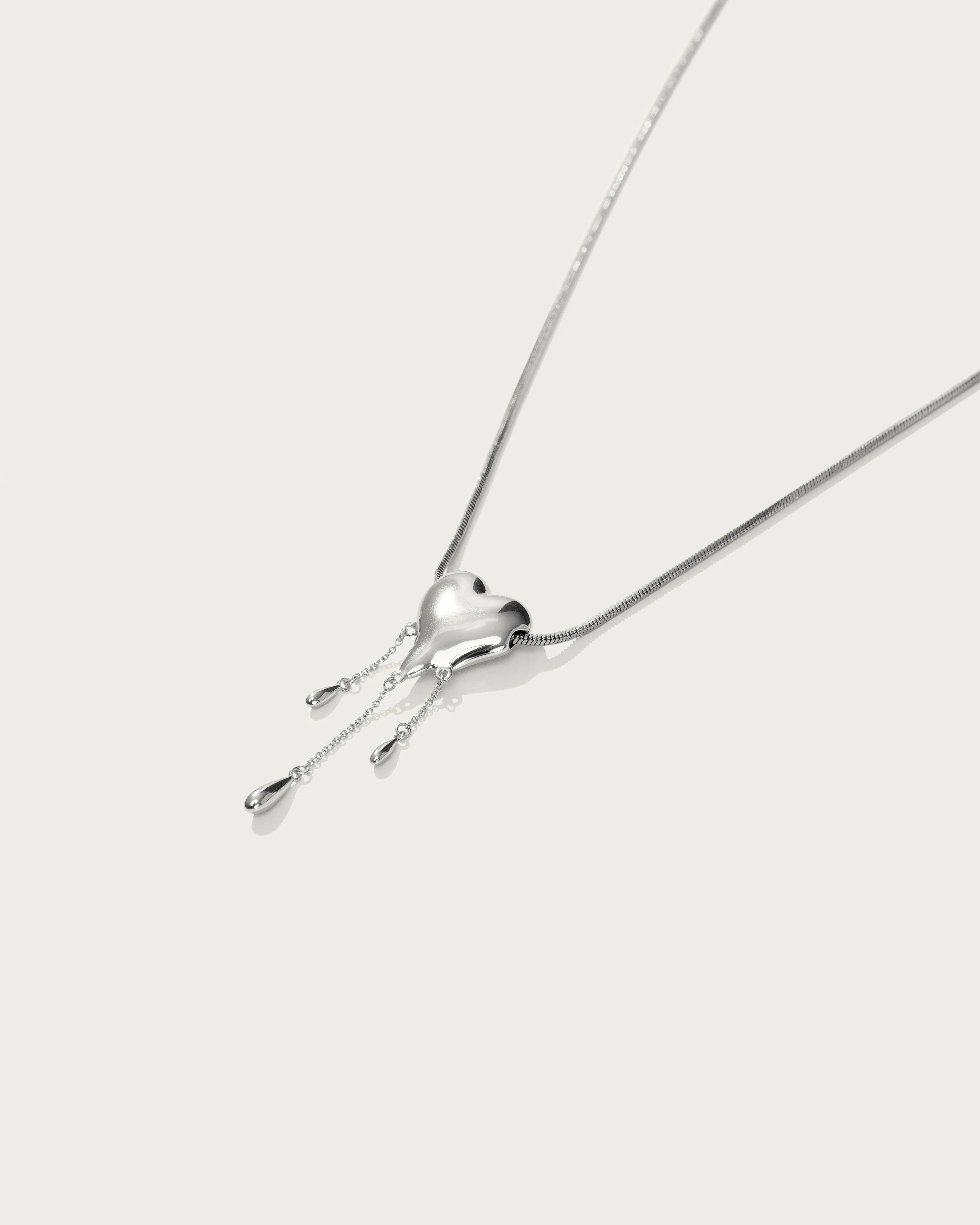 Venom??s Golden Drip Heart Necklace in Silver