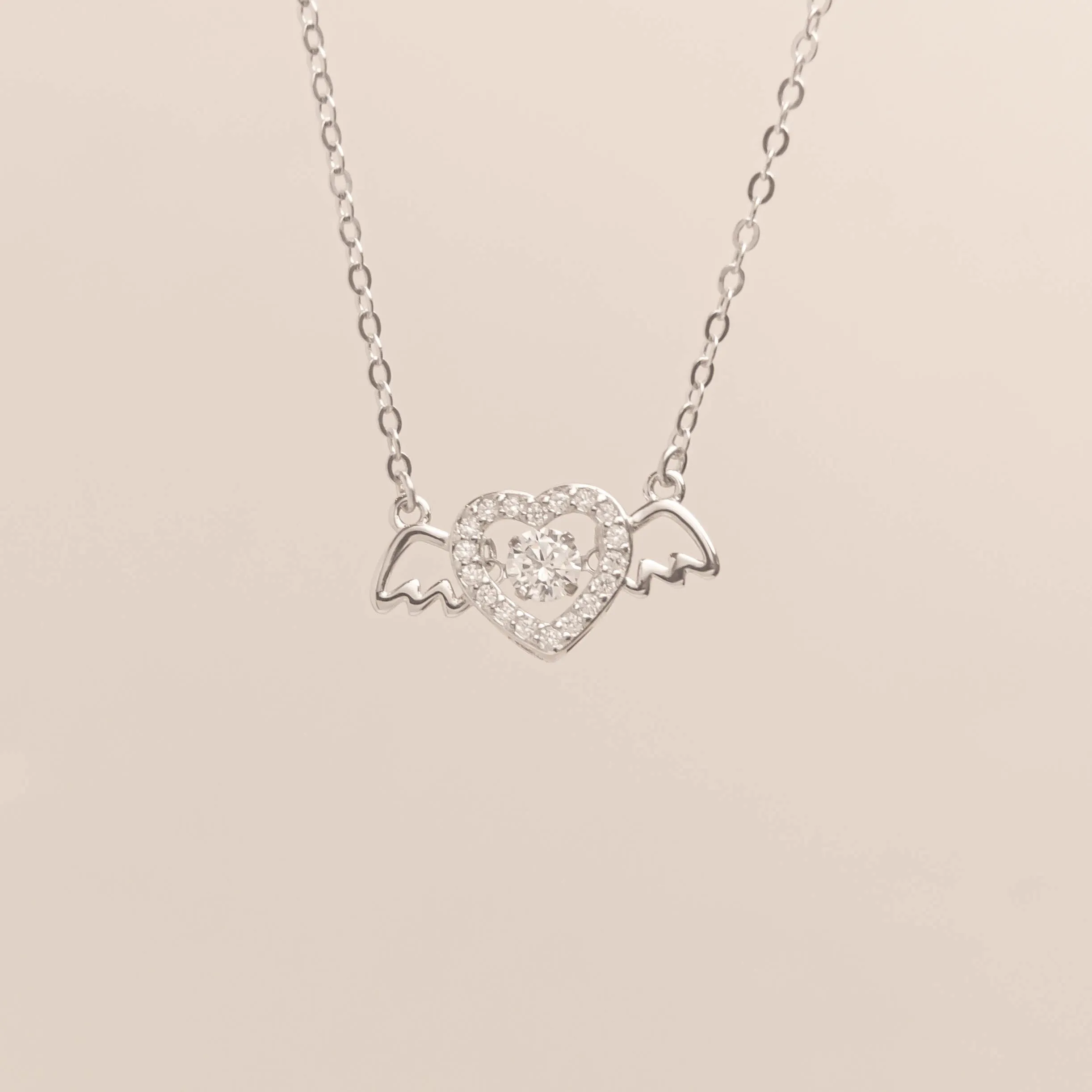 Winged Heart Beating Necklace